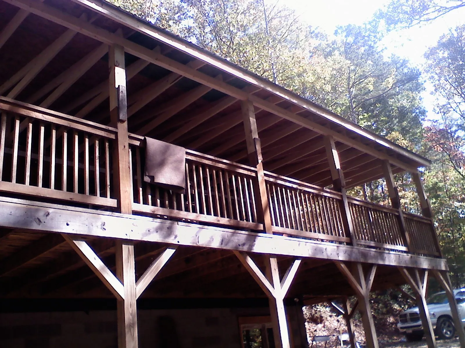 Timber framing under a new elevated porch and deck — Roof Leak Repair in Tolland by Roofing Brothers